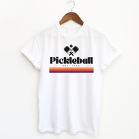Experience the retro vibes and timeless comfort of our 1965 Pickleball Women's T-shirt. Step back in time and pay tribute to pickleball's origins with our "old-school",vintage vibe collection that blends classic charm with modern style. Feel the premium softness of the fabric on your skin, and express your timeless style on and off the court. Wear it on and off the pickleball court!