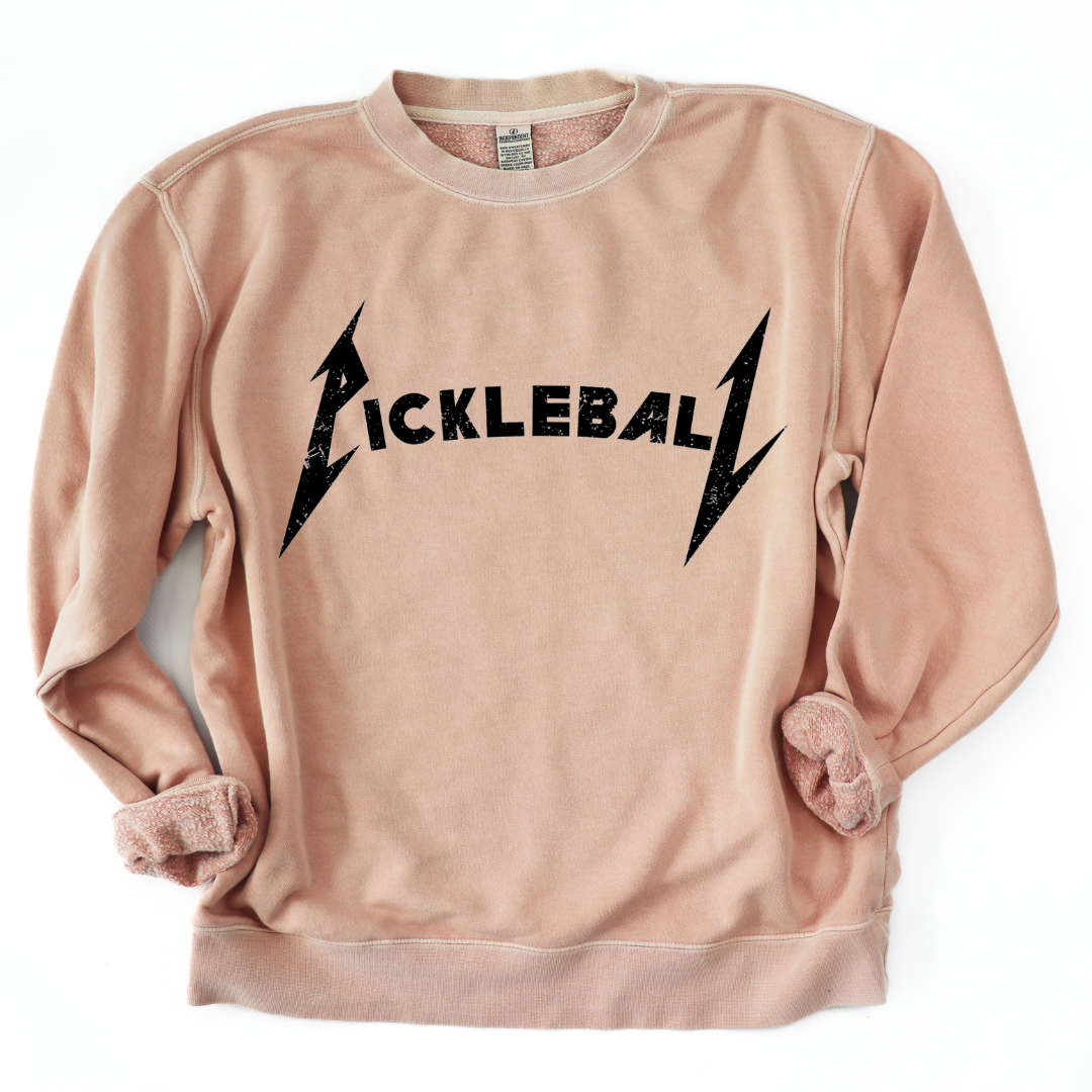 Rock the court with this super soft pigment dyed sweatshirt , styled in the iconic font of a legendary rock band. It's a fusion of music and sport that's bound to turn heads on and off the court. Get ready to unleash your inner pickleball rockstar!