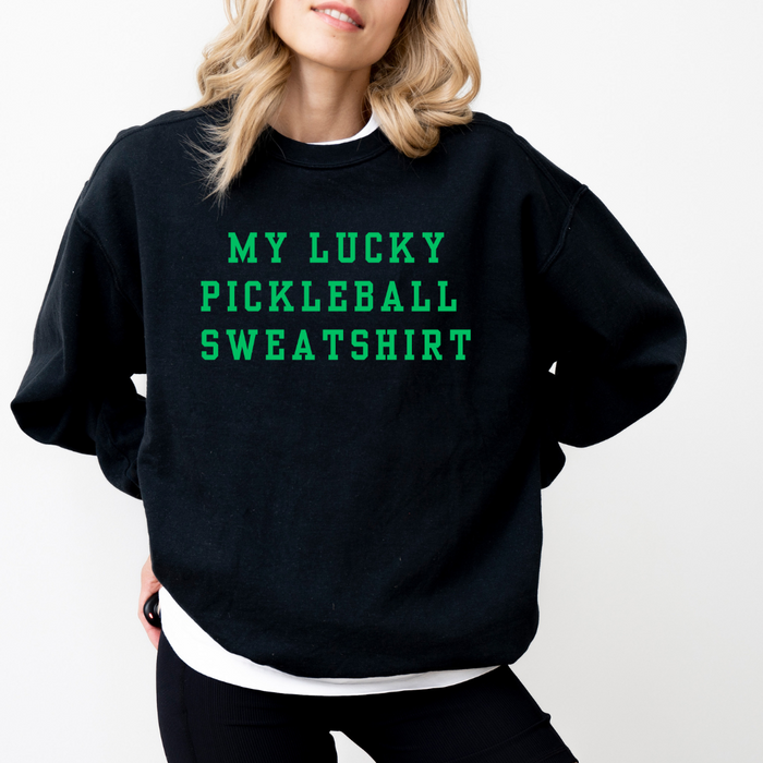 Introducing our festive Limited Edition My Lucky Pickleball Sweatshirt, just in time for St. Patrick’s Day fun! And since this one doesn't have four leaf clovers on it you can wear it any day of the year.  Your opponents will love your confidence!   Elevate your game with this charm-packed sweatshirt. Beyond its super-soft feel, it's a fun companion on and off the court. Who knows, it might just sprinkle some pickleball luck your way!   Grab yours and let the good vibes roll! 