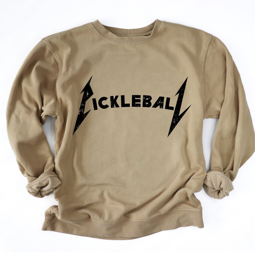 Rock the court with this super soft pigment dyed sweatshirt , styled in the iconic font of a legendary rock band. It's a fusion of music and sport that's bound to turn heads on and off the court. Get ready to unleash your inner pickleball rockstar!