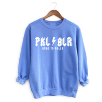 Introducing our PKLBLR Born To Rally Sweatshirt. Crafted with premium quality, it offers a range of great colors to match your style. Whether you're on the courts or out and about, it's the perfect choice to proudly represent yourself as a PKLBLR - a dedicated pickleballer who loves everything the game has to offer. Let's GO ballers! 