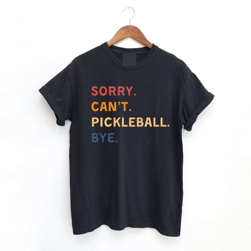 Introducing our "Sorry. Can't. Pickleball. Bye." T-shirt – your excuse for a life well-played! This super-soft and ultra-comfortable tee is designed for the pickleball enthusiasts who want to carry their love for the game wherever they roam. Perfect for making a statement and staying cozy, it's a must-have addition to your wardrobe. Let this t-shirt do the talking, and let everyone know you're off to conquer the courts!