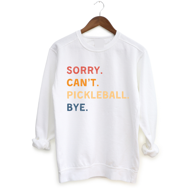 Introducing our "Sorry. Can't. Pickleball. Bye." Sweatshirt – your excuse for a life well-played! This super-soft and ultra-comfortable sweatshirt is designed for the pickleball enthusiasts who want to carry their love for the game wherever they roam.  Perfect for making a statement and staying cozy, it's a must-have addition to your wardrobe. Let this sweatshirt do the talking, and let everyone know you're off to conquer the courts!