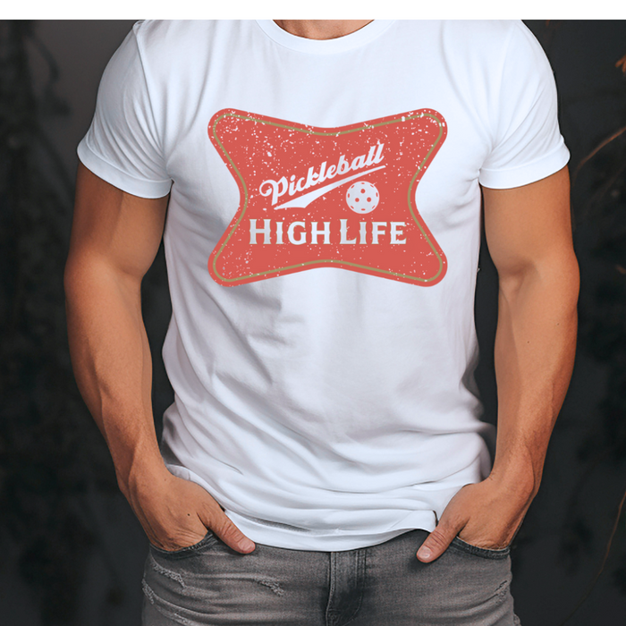 Show off your passion for pickleball with the Pickleball High Life Men's Tee. The stylish design captures the spirit of the game, while the lightweight fabric ensures comfort during any activity, whether you're competing on the court or out with friends. Elevate your game and your style.